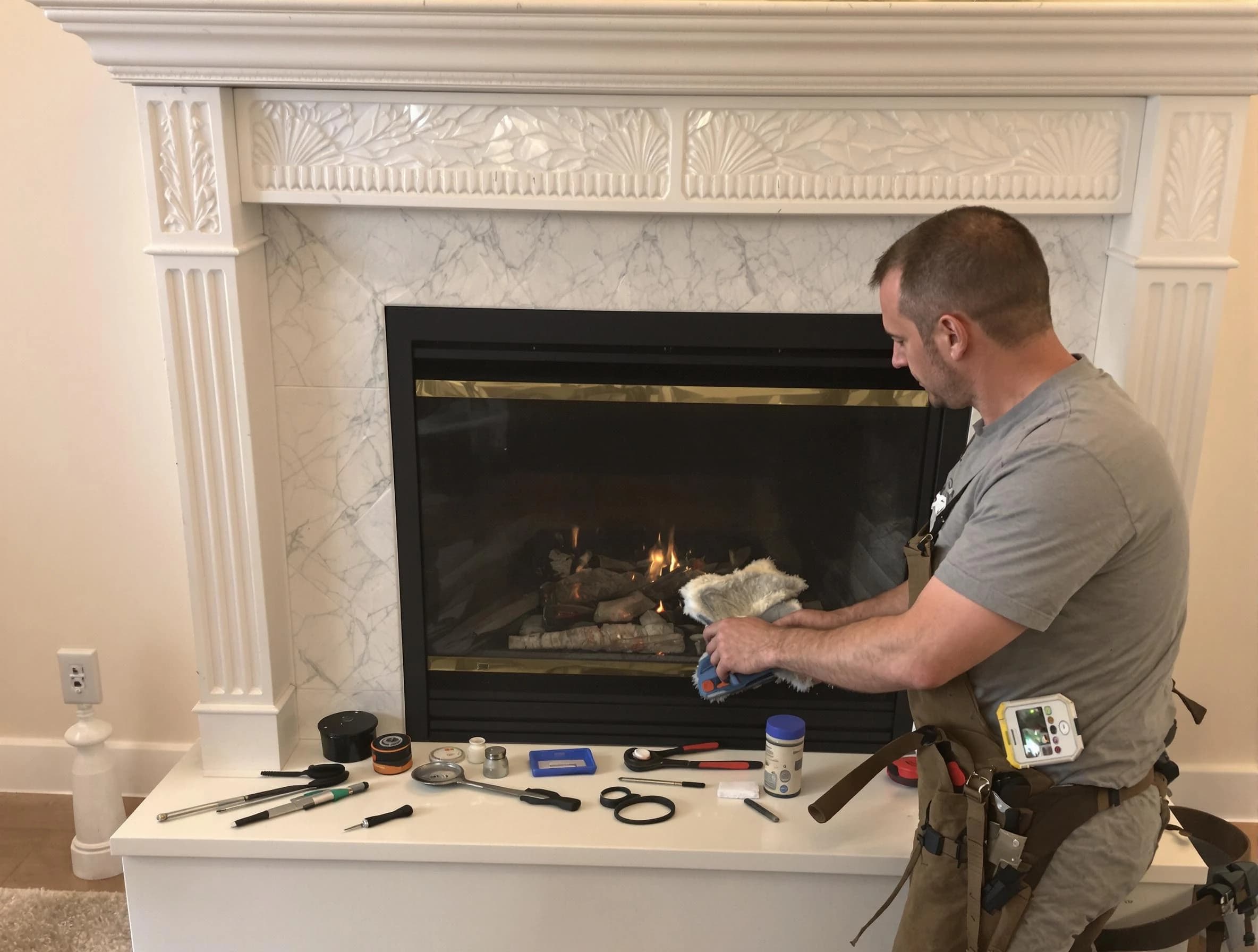 Peachtree Corners Chimney Sweep performing fireplace maintenance in Peachtree Corners, GA